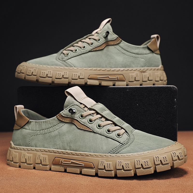 Low-top lace-up sneakers with panelled uppers and thick textured soles