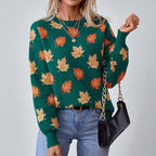 Women's crew neck sweater with an all-over leaf pattern and long sleeves