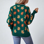 Women's crew neck sweater with an all-over leaf pattern and long sleeves