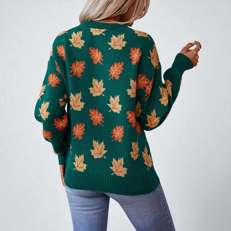 Women's crew neck sweater with an all-over leaf pattern and long sleeves