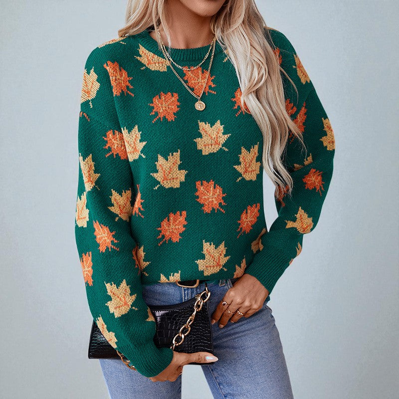 Women's crew neck sweater with an all-over leaf pattern and long sleeves