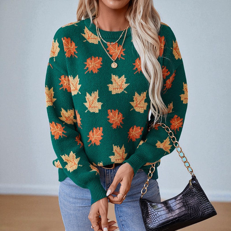 Women's crew neck sweater with an all-over leaf pattern and long sleeves