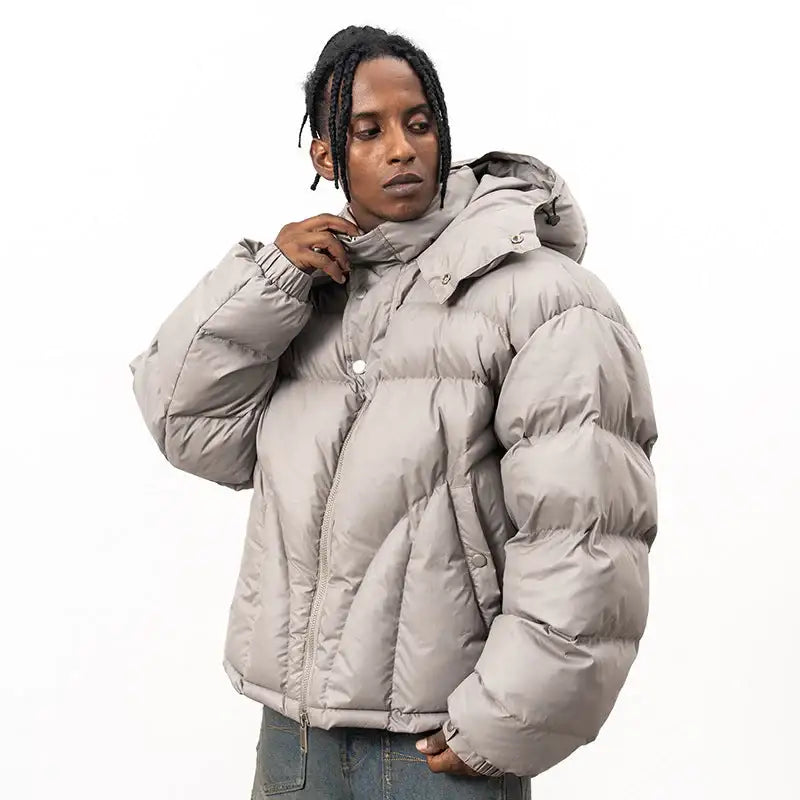 Men's stone hooded puffer jacket with quilted sections and front zip