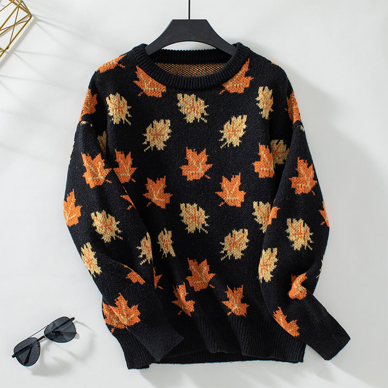 Women's crew neck sweater with an all-over leaf pattern and long sleeves