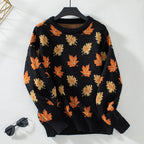 Women's crew neck sweater with an all-over leaf pattern and long sleeves