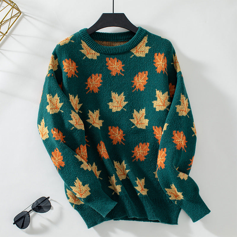 Women's crew neck sweater with an all-over leaf pattern and long sleeves