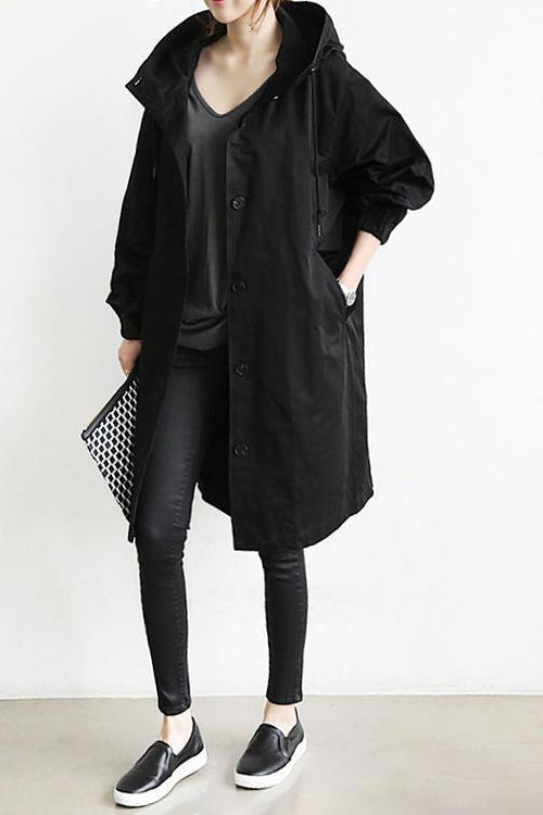 Women's longline hooded button-front trench coat with gathered cuffs and front pockets