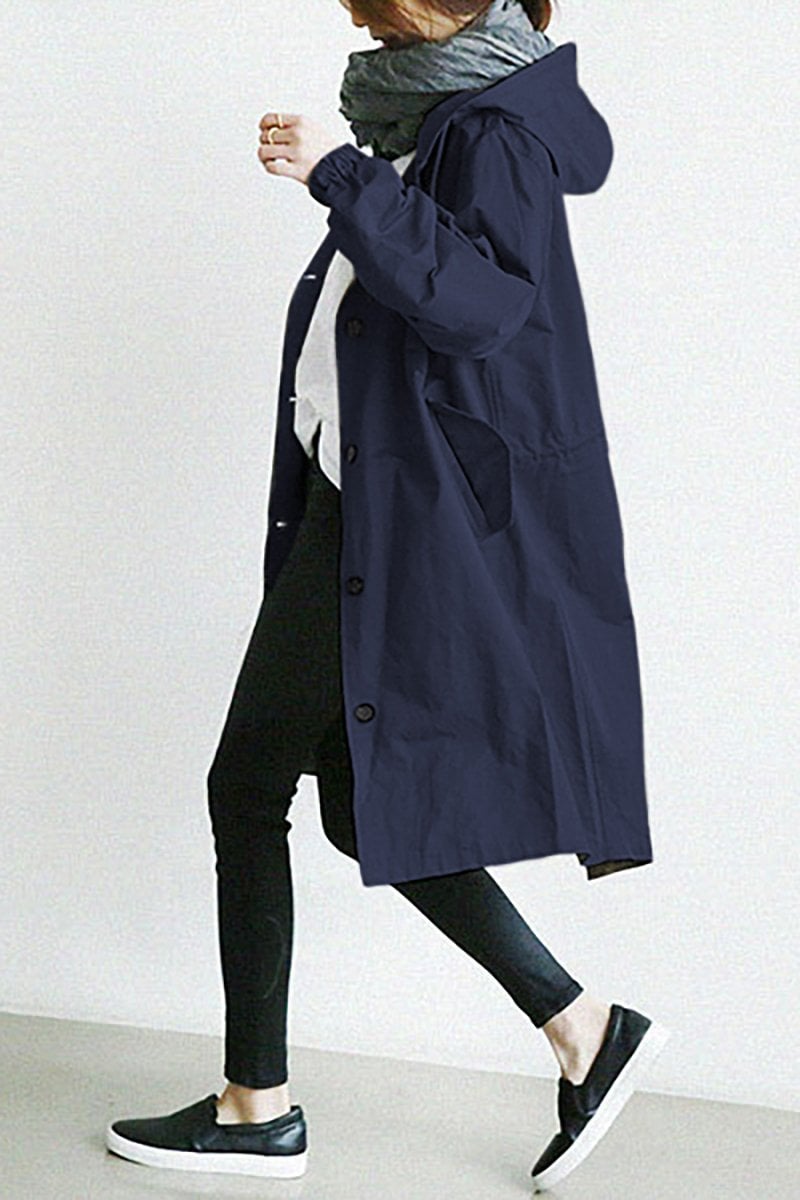 Women's longline hooded button-front trench coat with gathered cuffs and front pockets