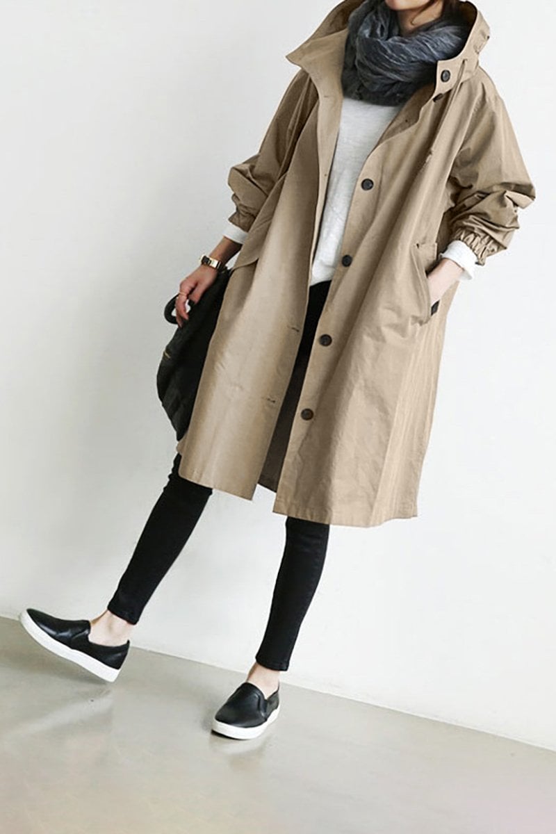 Women's longline hooded button-front trench coat with gathered cuffs and front pockets