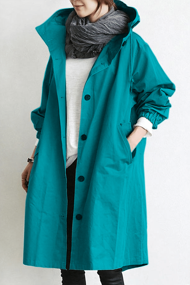 Women's longline hooded button-front trench coat with gathered cuffs and front pockets