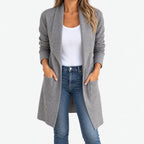 Women's long grey open-front cardigan with shawl collar and side pockets