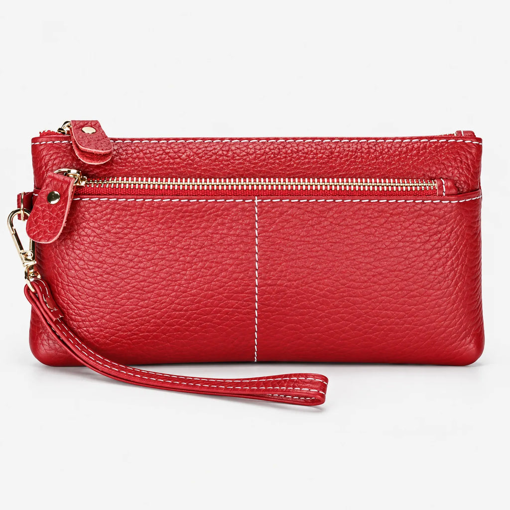 Textured women's zip purse with wrist strap and contrast stitching