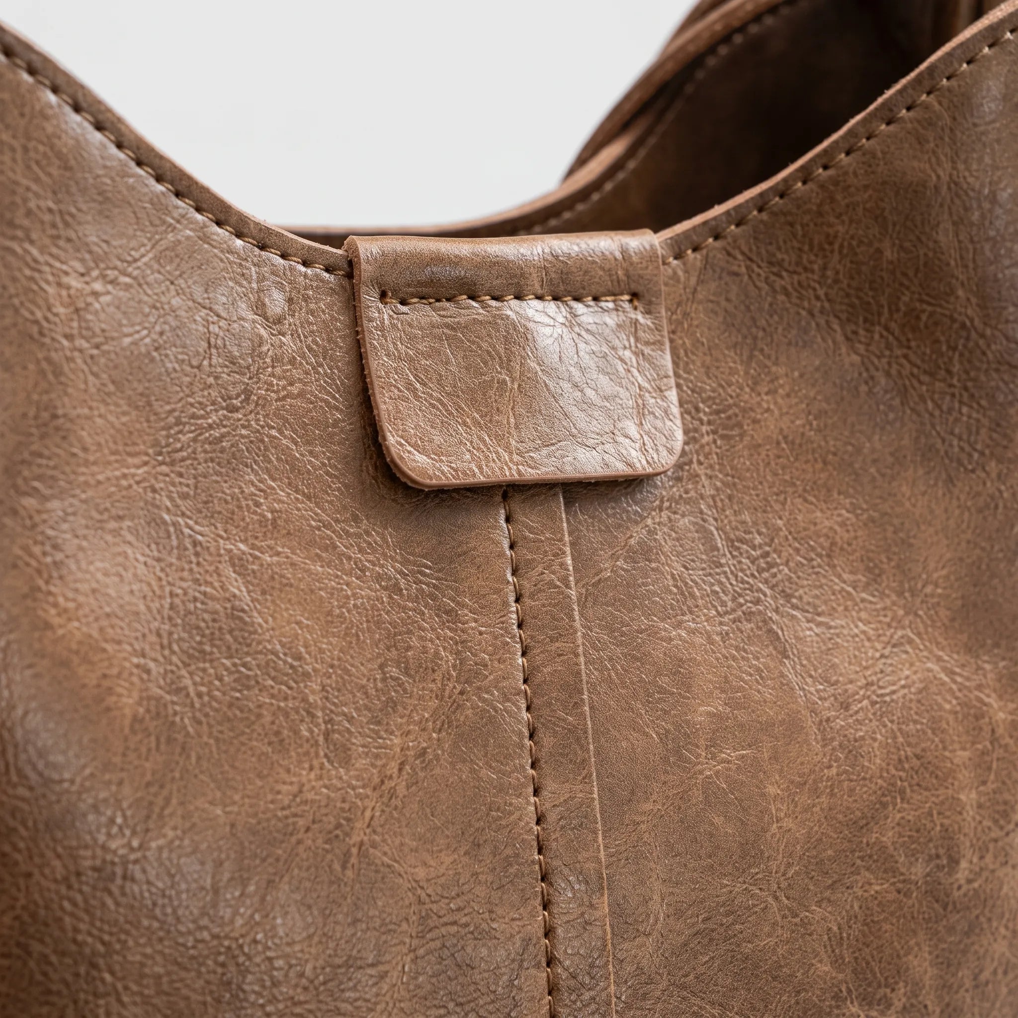 Marvona  - Curved Silhouette Over The Shoulder Bag Carrying Everyday Essentials