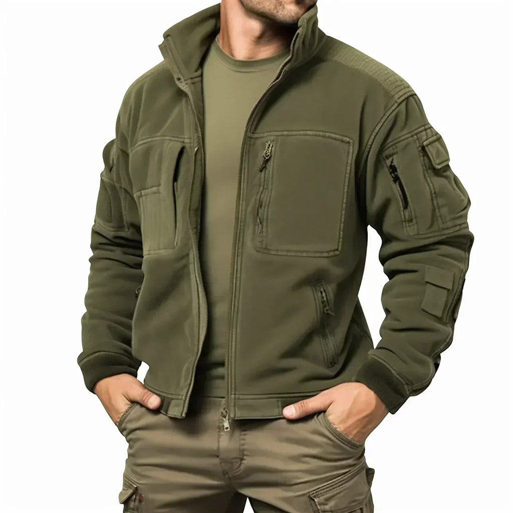Men's green utility jacket with high collar, front zip and multiple pockets