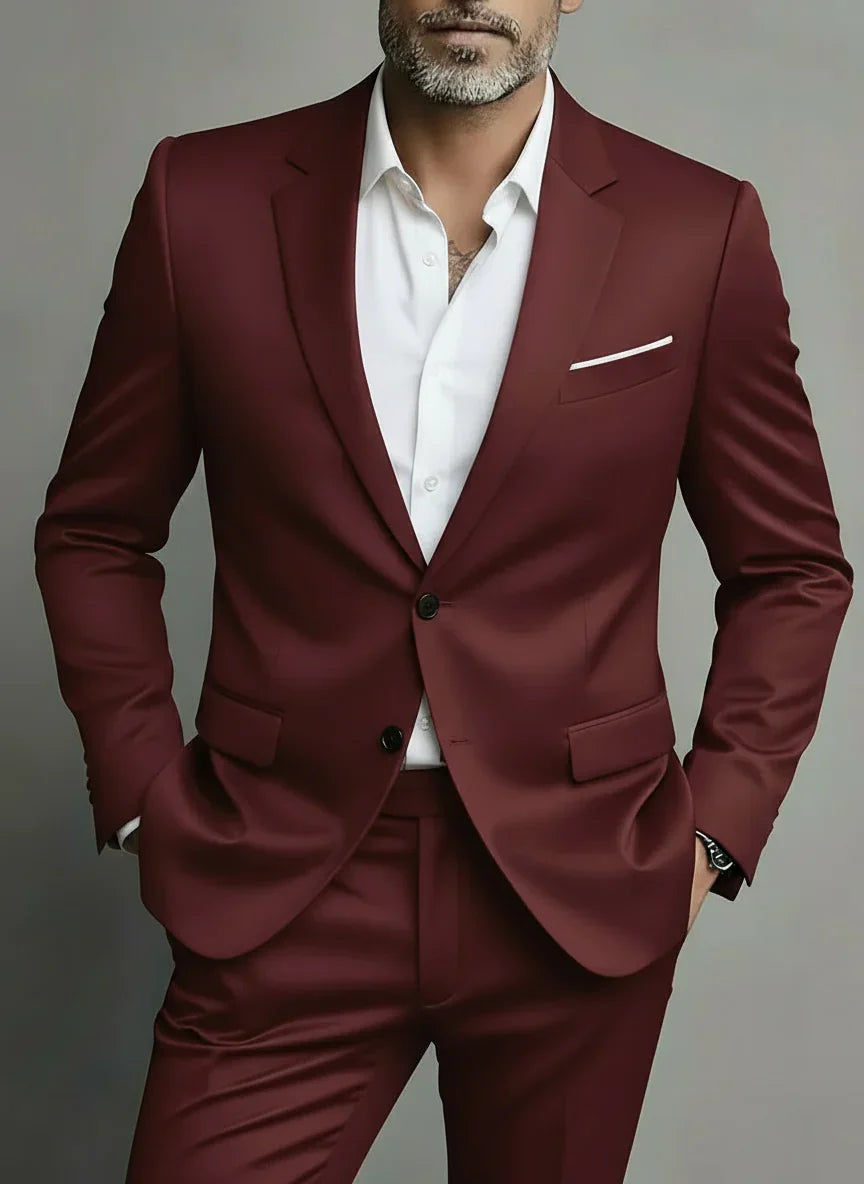 Men's burgundy slim fit suit with notched lapels, button jacket and matching trousers