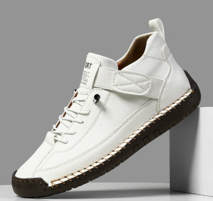 Women's high-top lace-up trainers with stitched panels and flat soles