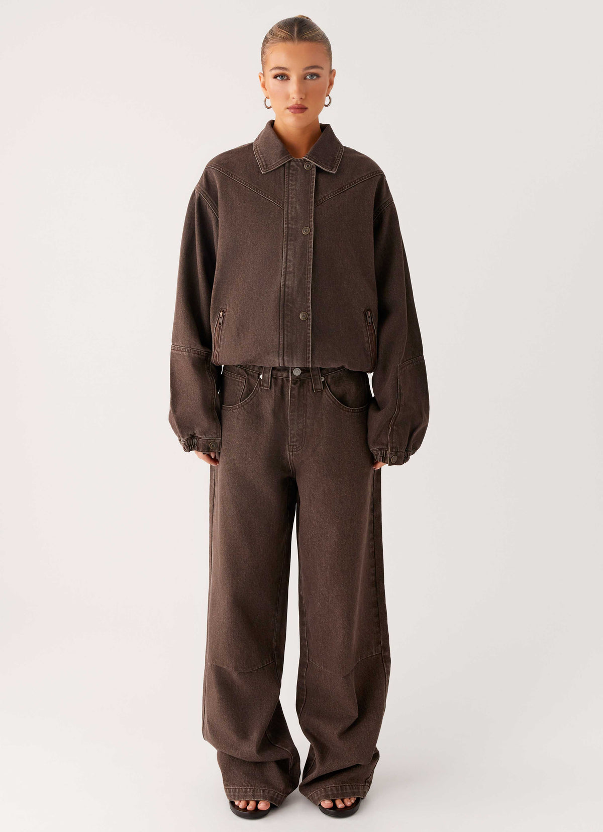 Women's brown washed denim bomber jacket with collar and cropped fit