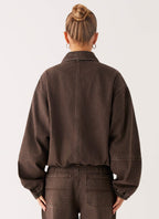 Women's brown washed denim bomber jacket with collar and cropped fit