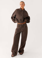 Women's brown washed denim bomber jacket with collar and cropped fit