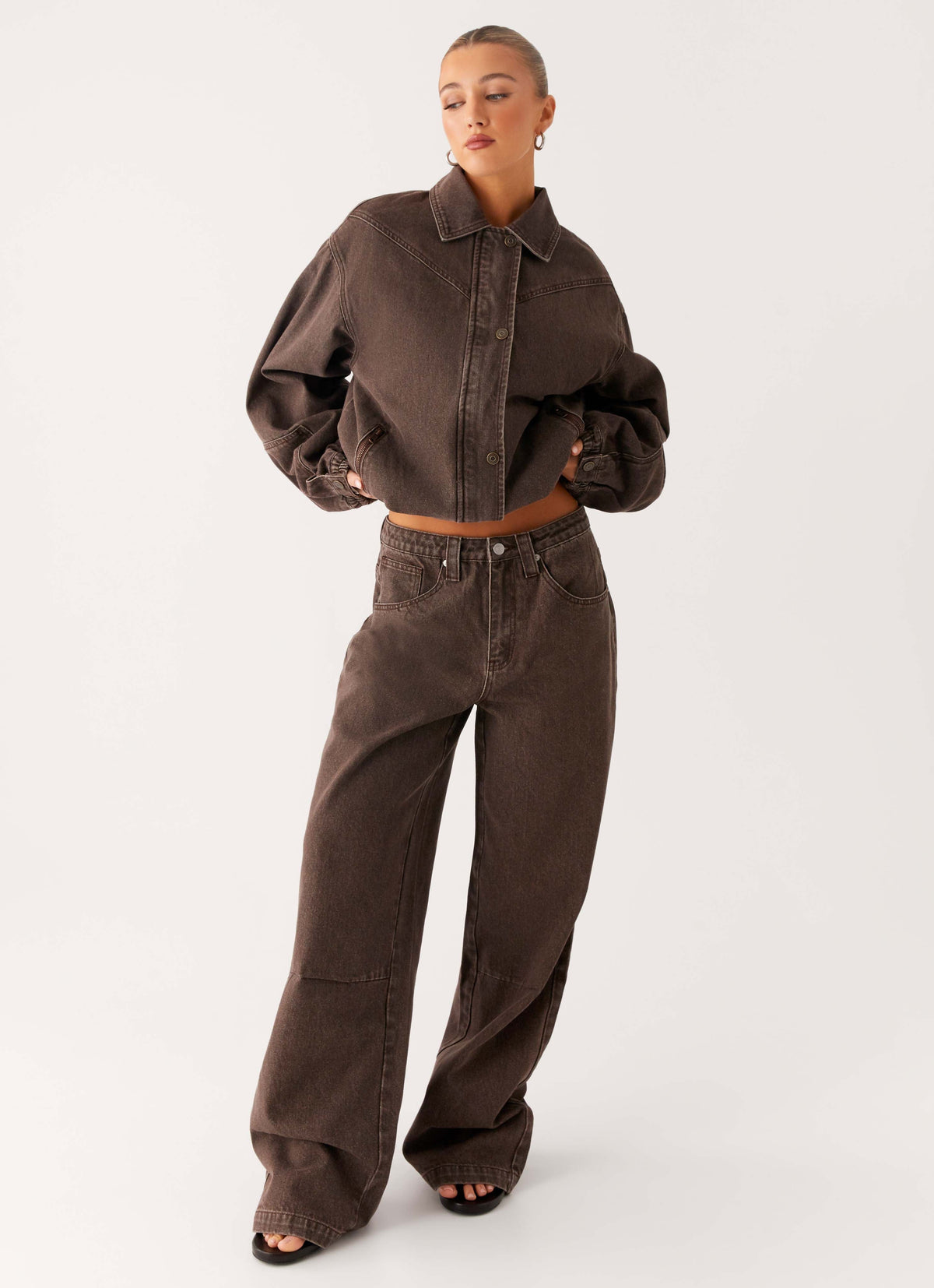 Women's brown washed denim bomber jacket with collar and cropped fit