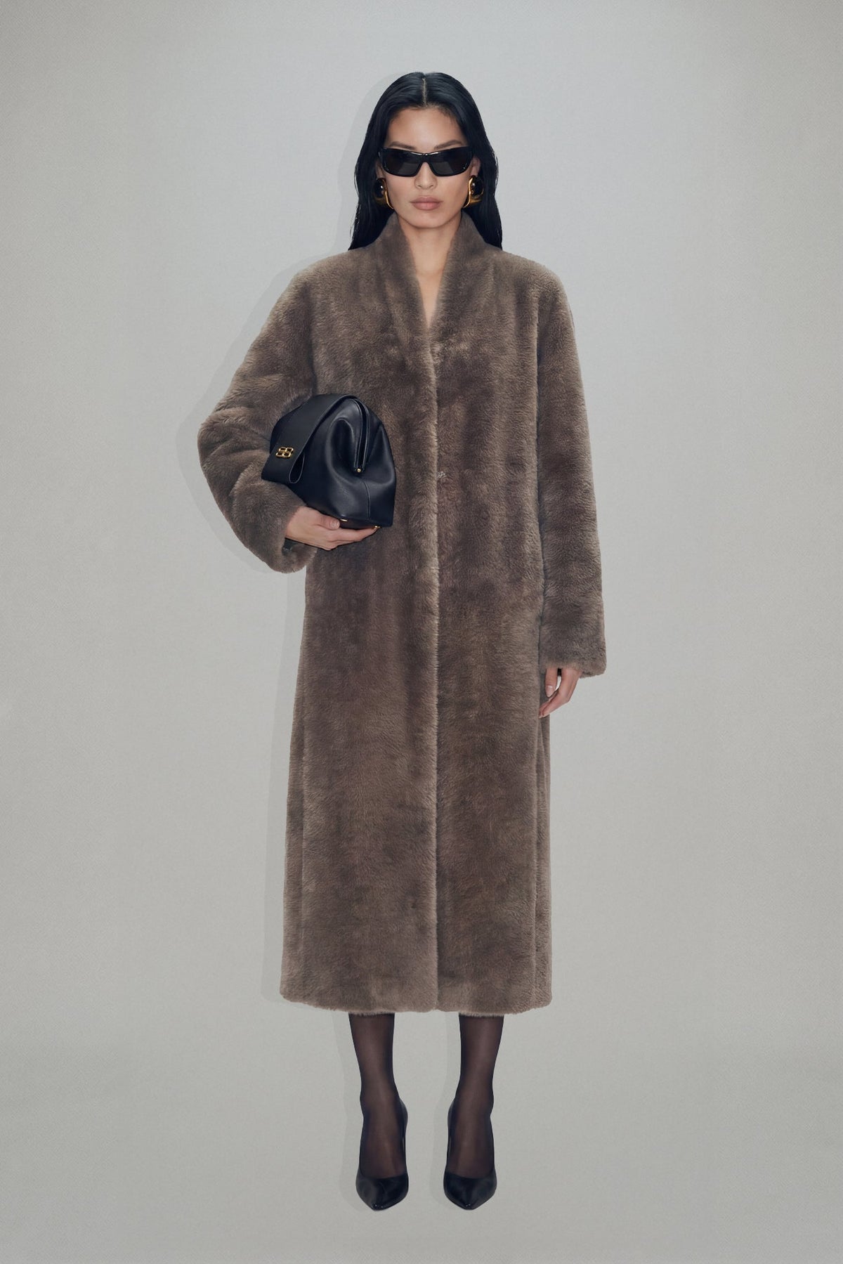 Women's brown longline coat with plush fur-effect texture and shawl collar