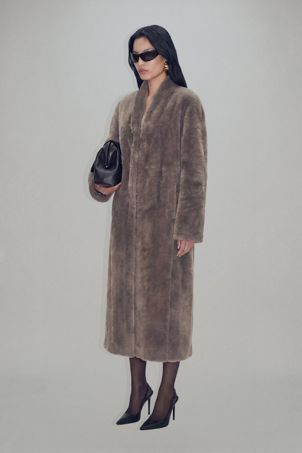 Women's brown longline coat with plush fur-effect texture and shawl collar