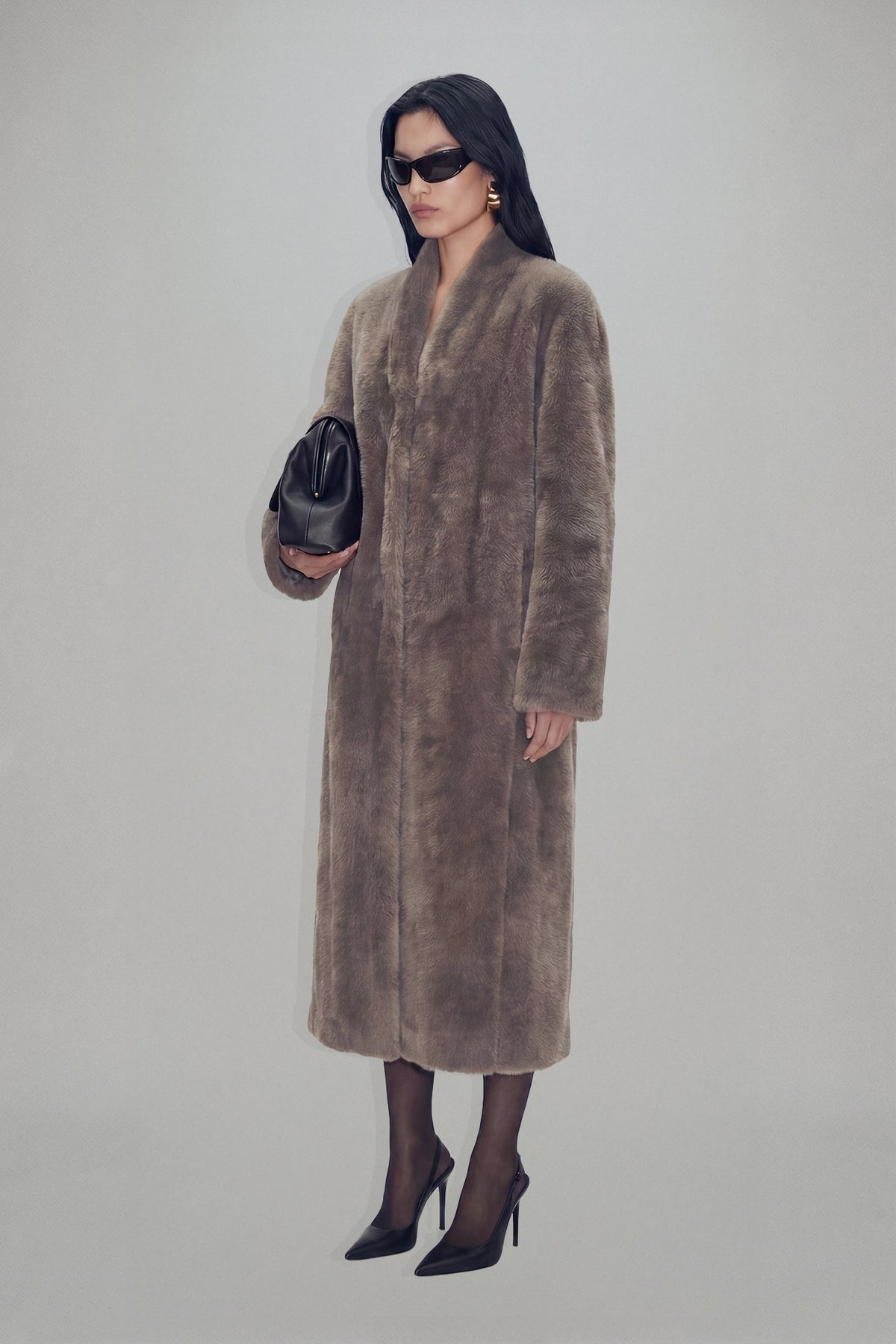 Women's brown longline coat with plush fur-effect texture and shawl collar
