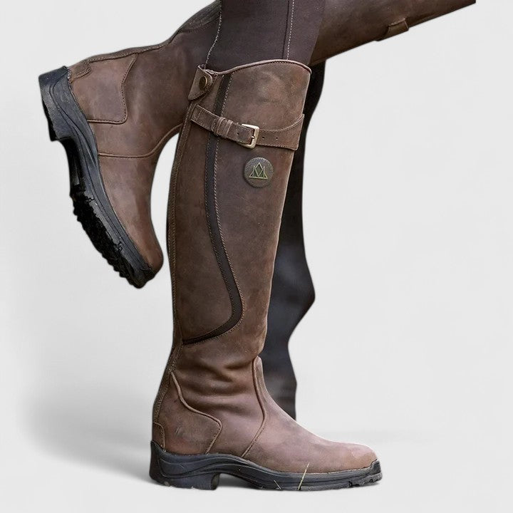 Women's knee-high boots with buckle straps, round toes and low heels
