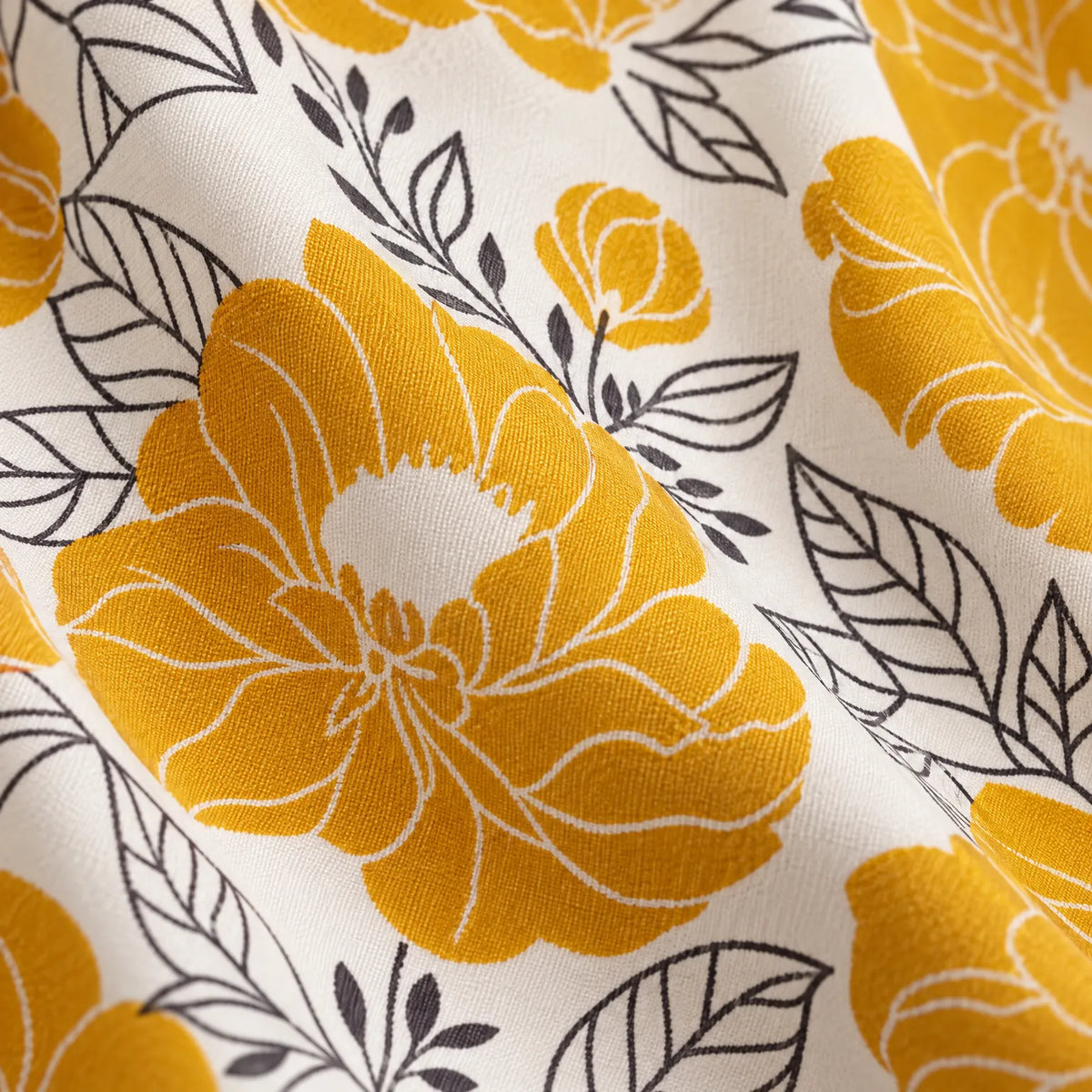 Women's cream floral A-line midi skirt with yellow flowers and dark leaf outlines