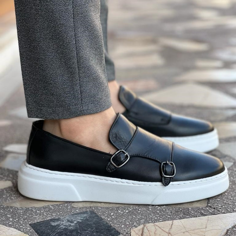 Men's double monk strap slip-on loafers shown in black and brown with white soles