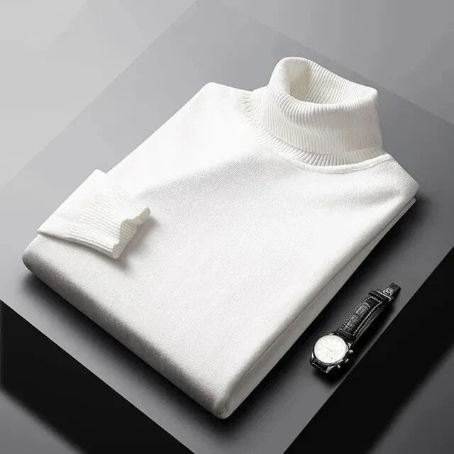 Men's plain ribbed turtleneck jumper folded on a surface