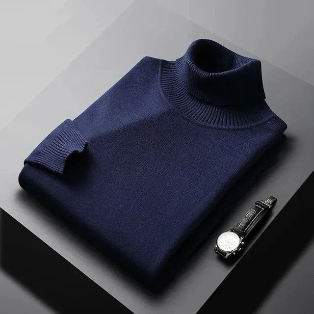 Men's plain ribbed turtleneck jumper folded on a surface