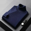 Men's plain ribbed turtleneck jumper folded on a surface