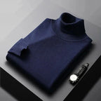 Men's plain ribbed turtleneck jumper folded on a surface