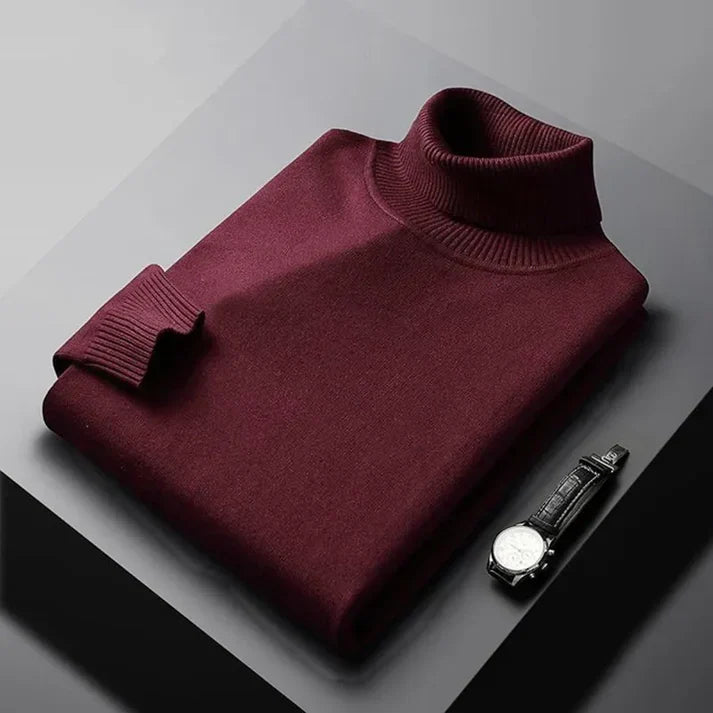 Men's plain ribbed turtleneck jumper folded on a surface