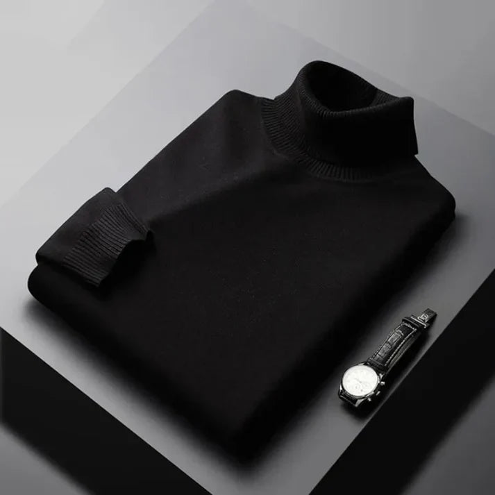 Men's plain ribbed turtleneck jumper folded on a surface