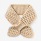Textured knitted bowknot neckerchief scarf worn over a jumper