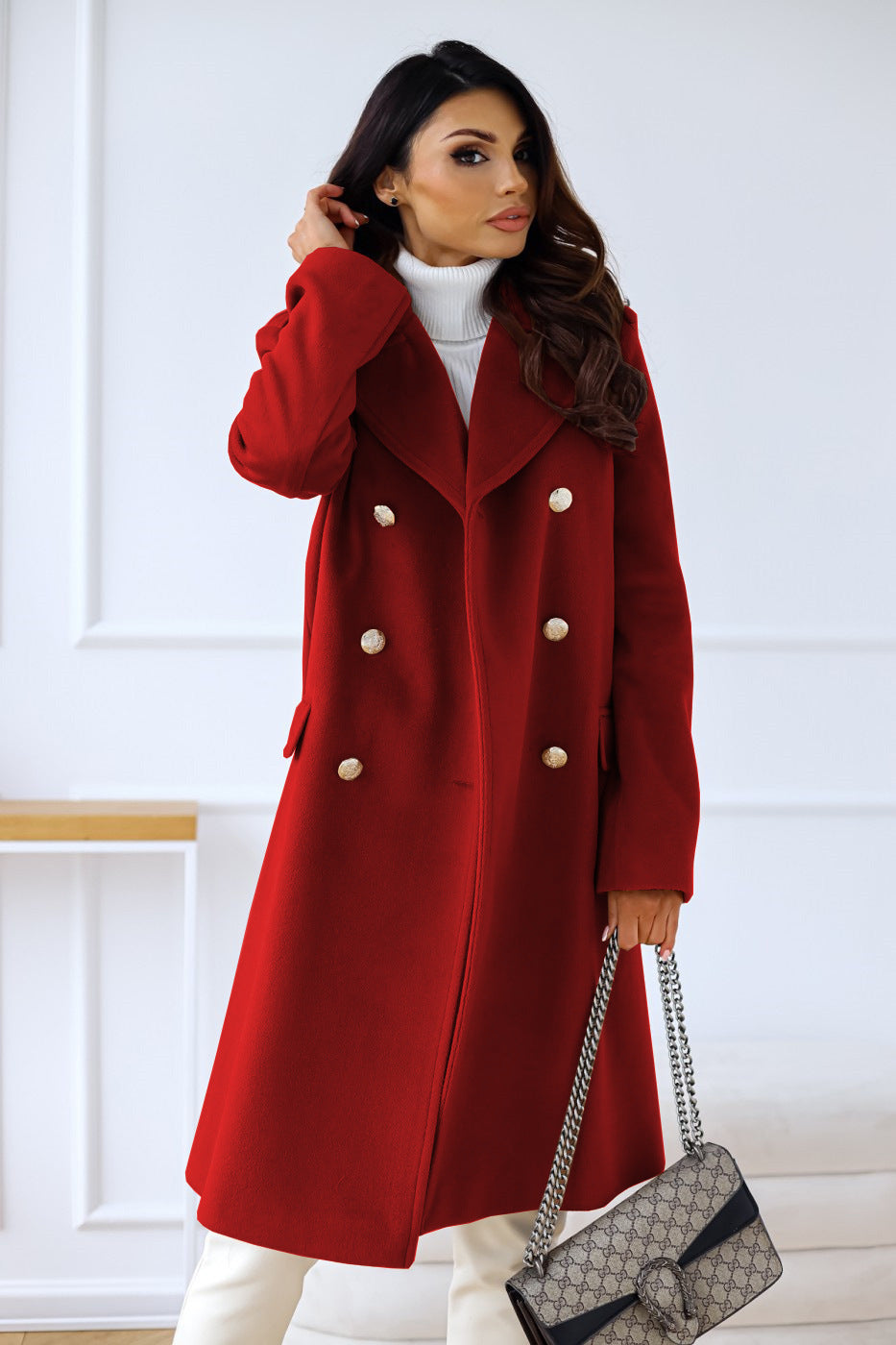 Women's long double-breasted coat with notched lapels and flap pockets