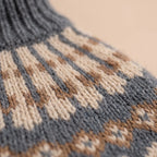 Women's knitted Fair Isle turtleneck jumper with long sleeves and patterned yoke