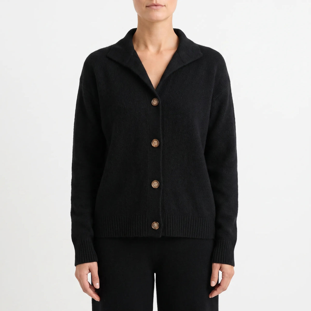 Women's collared textured knit cardigan with long sleeves and button front