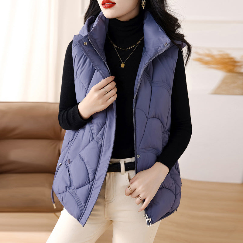 Women's quilted padded gilet with hood, zip front and patch pockets