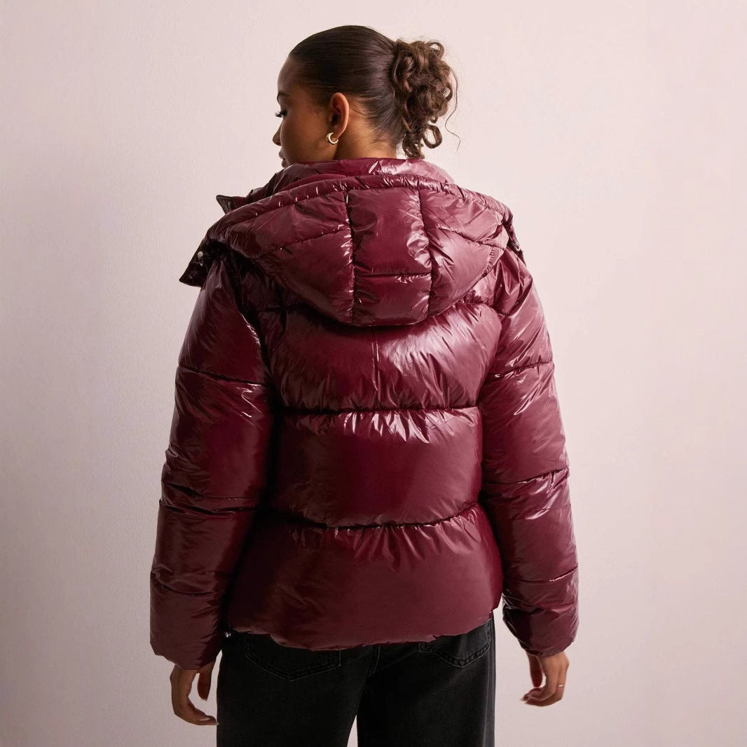 Women's shiny quilted puffer jacket with detachable hood and zip fastening