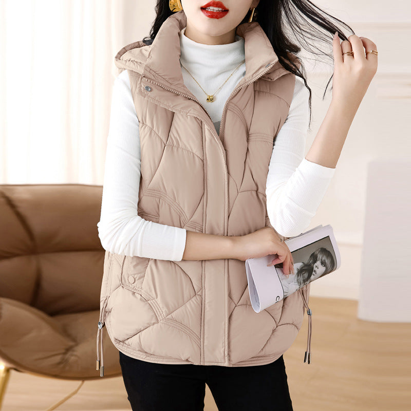 Women's quilted padded gilet with hood, zip front and patch pockets