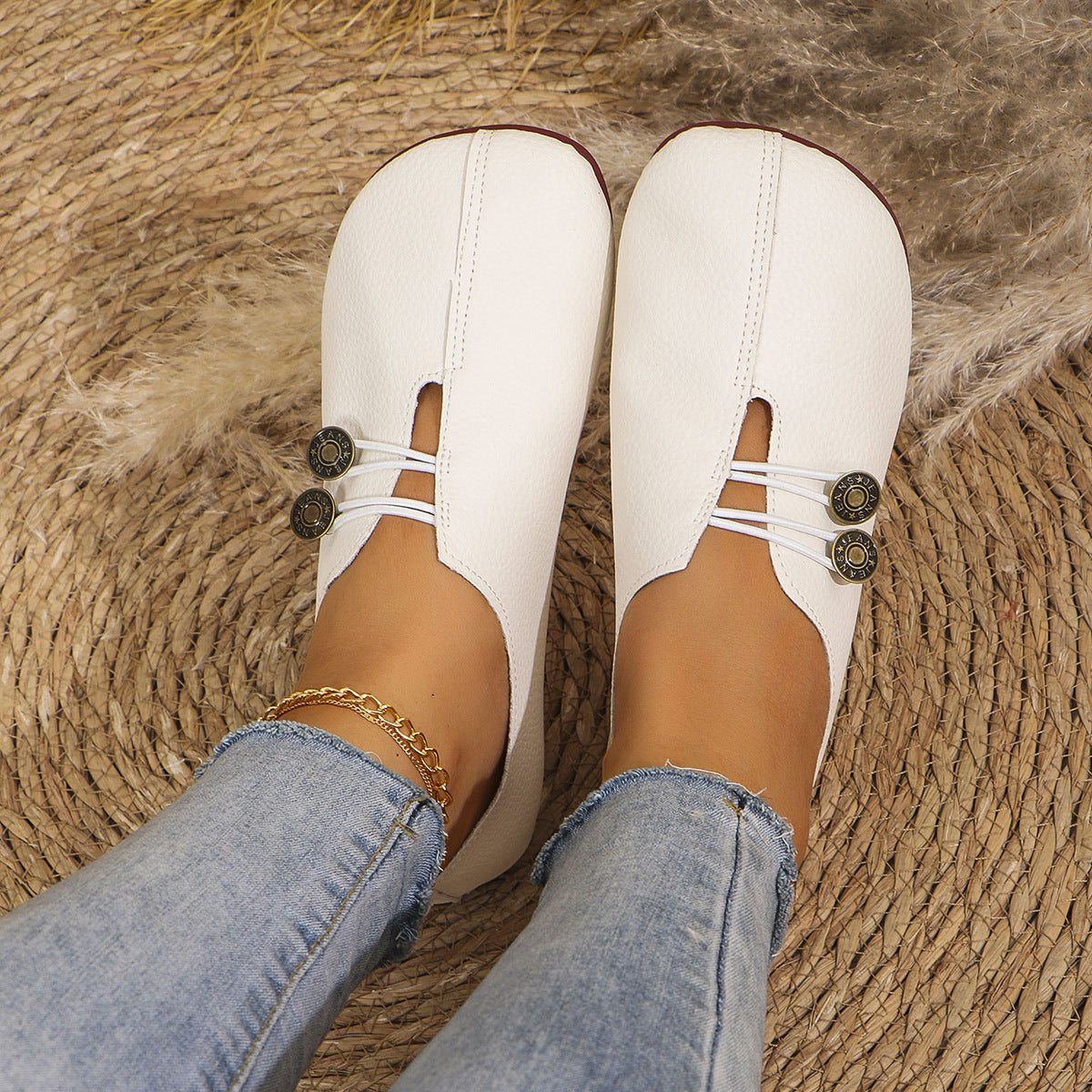 Women's flat slip-on shoes with elastic lace detail and round buttons