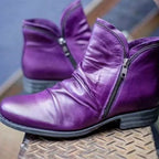 Women's ankle boots with side zips, ruched detailing and low heels