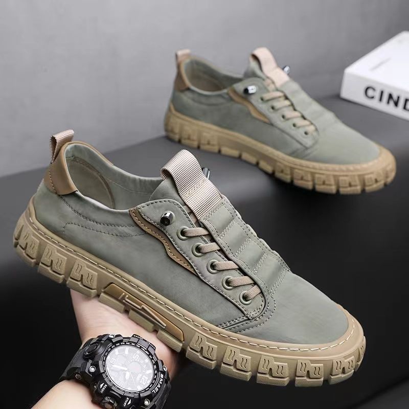Low-top lace-up sneakers with panelled uppers and thick textured soles