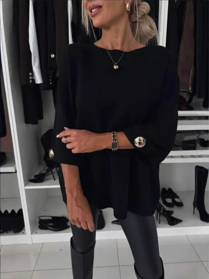 Women's knitted jumper with round neckline, three-quarter sleeves and button cuffs