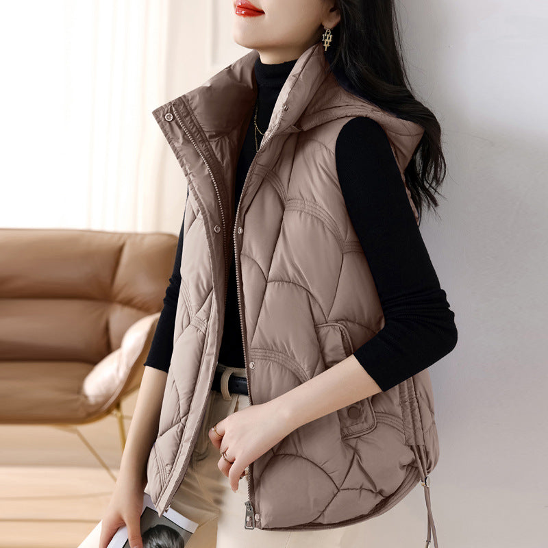 Women's quilted padded gilet with hood, zip front and patch pockets
