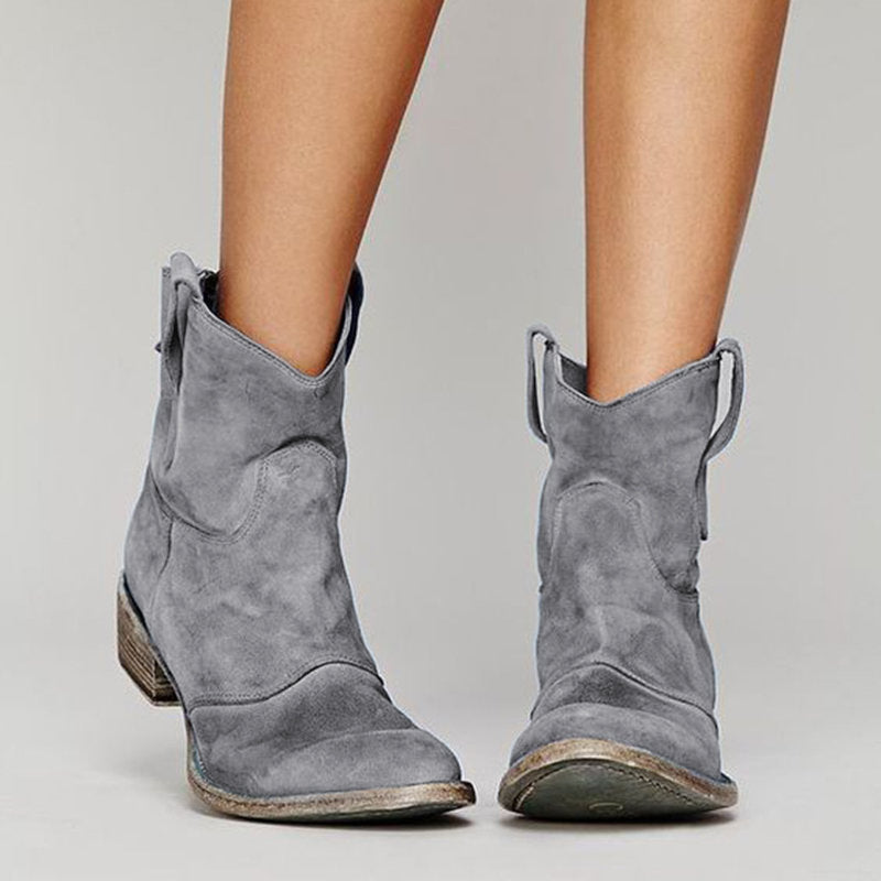 Women's ankle boots with pull tabs, stitched panels and block heels