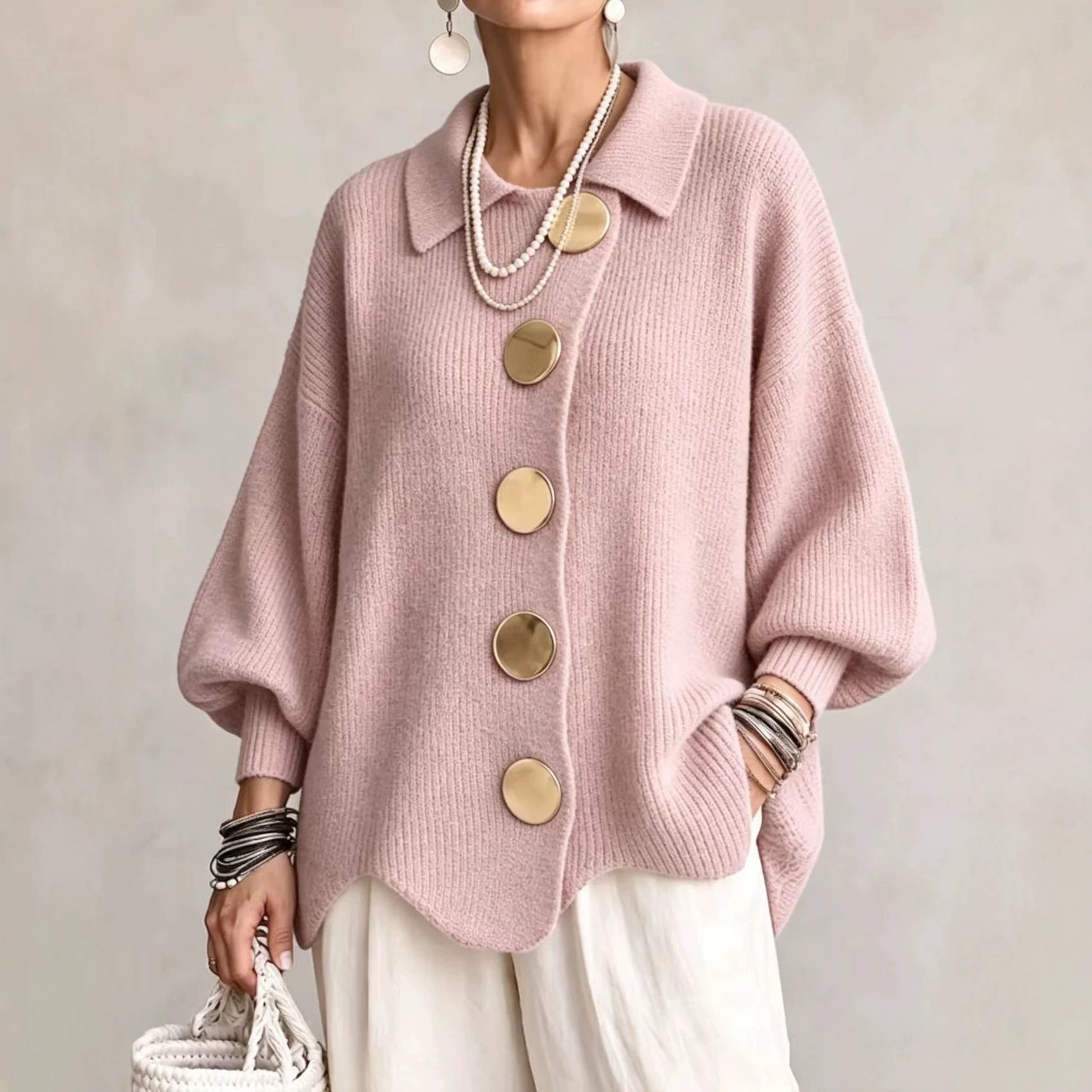 Women's oversized ribbed cardigan with collared neckline and button front